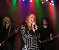 Christy Angeletti on stage with her band